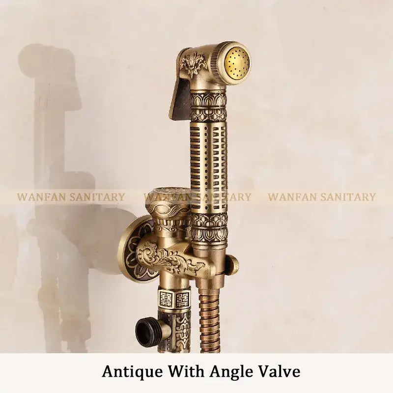 Ornate engraved gold brass wall mounted bidet faucet with antique brass finish and floral geometric details decorbites brass wall