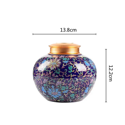 Ornate purple ceramic storage jar with floral patterns and golden lid for tea pot kitchen use