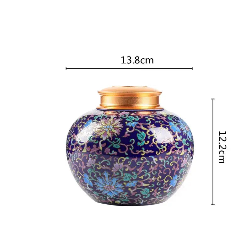 Ornate purple ceramic storage jar with floral patterns and golden lid for tea pot kitchen use