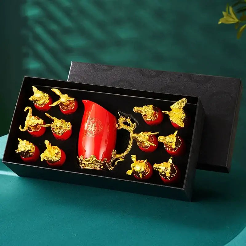 Red ceramic shot glasses with gold dragon handle and golden animal head ceramic figurines for dining room use