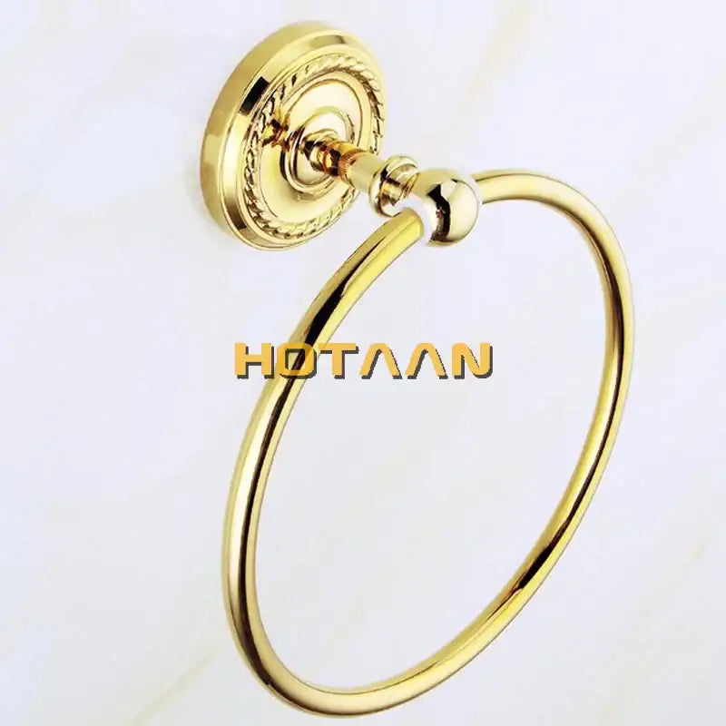 Ornate gold brass towel ring with polished finish and braided mounting plate from decorbites brass bathroom accessories set