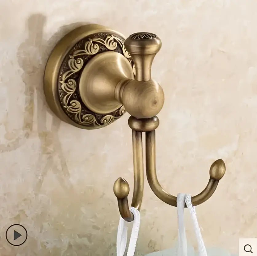 Antique brass double hook with ornate floral detailing and polished finish from decorbites copper carved bathroom accessories set