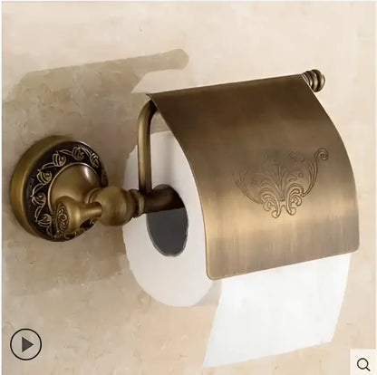Antique brass toilet paper holder with ornate floral engraving and decorative base from decorbites copper carved bathroom set
