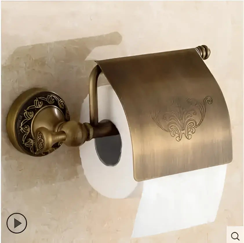 Antique brass toilet paper holder with ornate floral engraving and decorative base from decorbites copper carved bathroom set