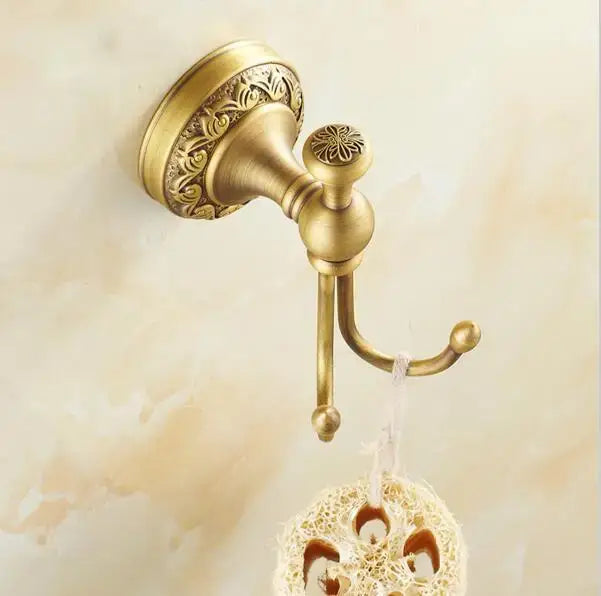Antique brass double hook towel rack with ornate floral detailing in decorbites copper carved bathroom accessories set
