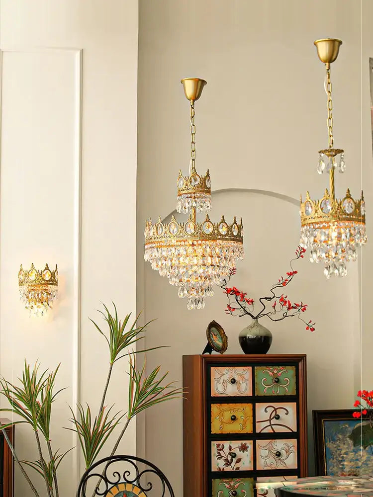 Ornate gold crown crystal led pendant light with intricate design and cascading crystal droplets for living room decorbites crystal led