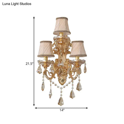 Ornate gold metal fixture living room sconce with three beige fabric shades and dangling crystal teardrop pendants inch fixture