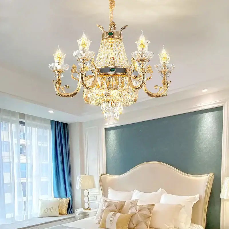 Ornate gold crystal dining room chandelier with green gemstone accents for elegant decorbites crystal dining decor