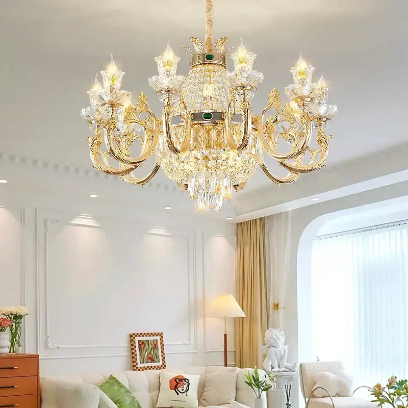 Ornate gold crystal dining room chandelier with green gemstone accents perfect for decorbites crystal dining decor