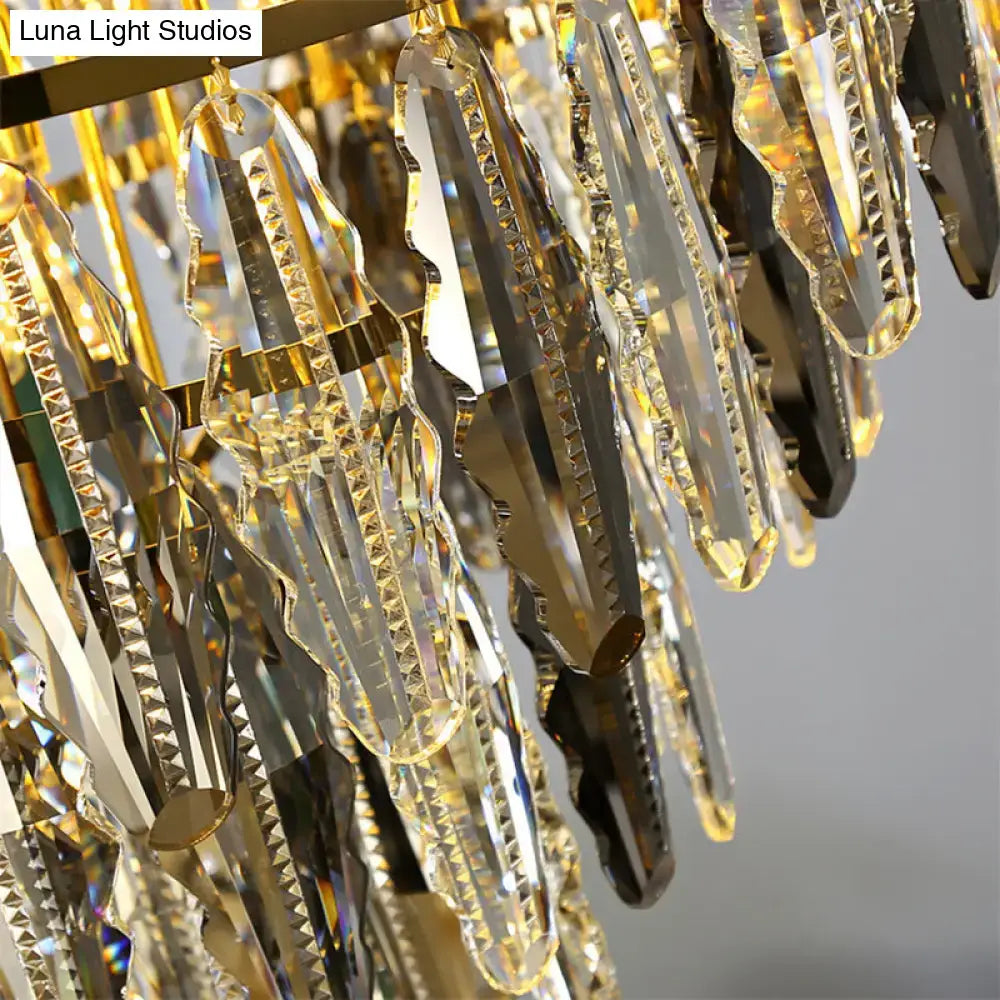 Golden minimalist crystal leaf pendant light with clear crystal prisms in cascading tiers and elegant fixture width