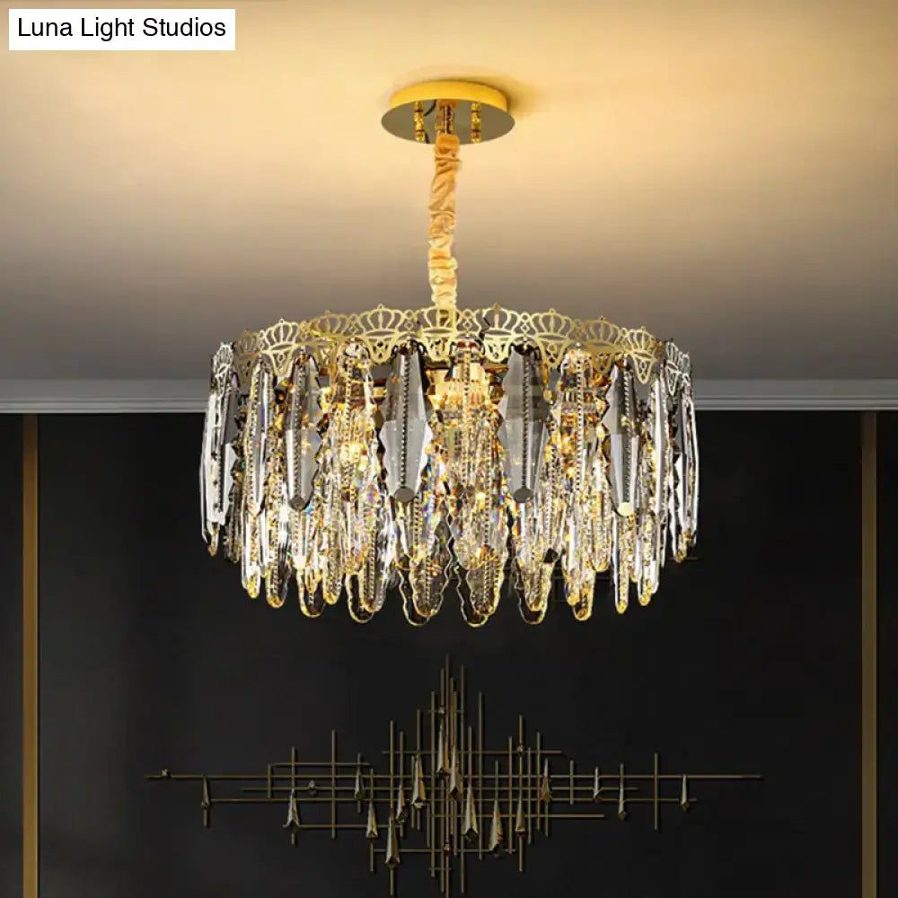DecorBites™ minimalist crystal leaf pendant light featuring a gold-toned chandelier with clear crystal droplets and crown frame