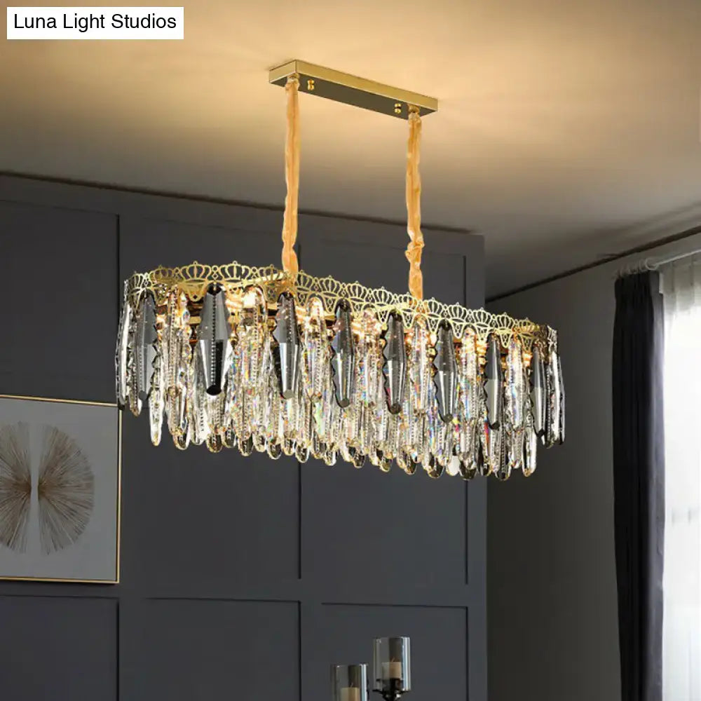 DecorBites™ gold-toned minimalist crystal leaf pendant light with clear crystal teardrop pendants and elegant fixture width