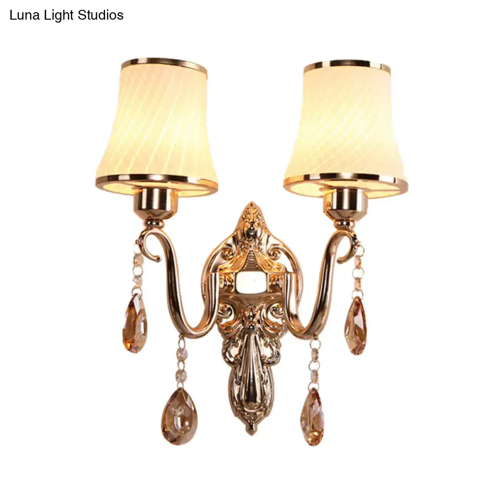 Ornate gold crystal wall sconce with two cream fabric shades and amber crystals for e26 e27 bulb base lighting