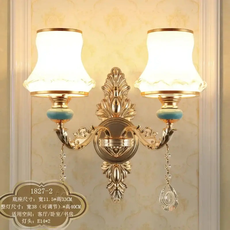 Ornate gold crystal wall sconce with cream fabric shades and turquoise ceramic accents for elegant bedroom decorbites crystal wall use