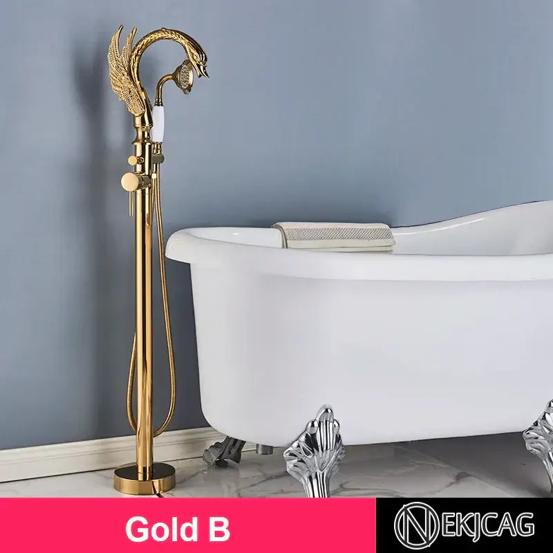 Ornate gold swan freestanding bathtub faucet with dragon-head spout and winged design for luxury bathroom decorbites
