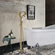 Ornate gold swan freestanding bathtub faucet with dragon-head design and adjustable handshower by decorbites gold swan