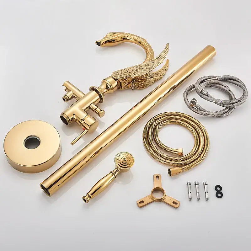 Ornate gold dragon freestanding bathtub faucet with decorbites gold swan polished brass finish and intricate wings design