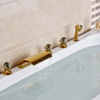 Ornate gold led waterfall bath tub faucet with crystal knobs and curved spout in sleek metallic finish for tub faucet use
