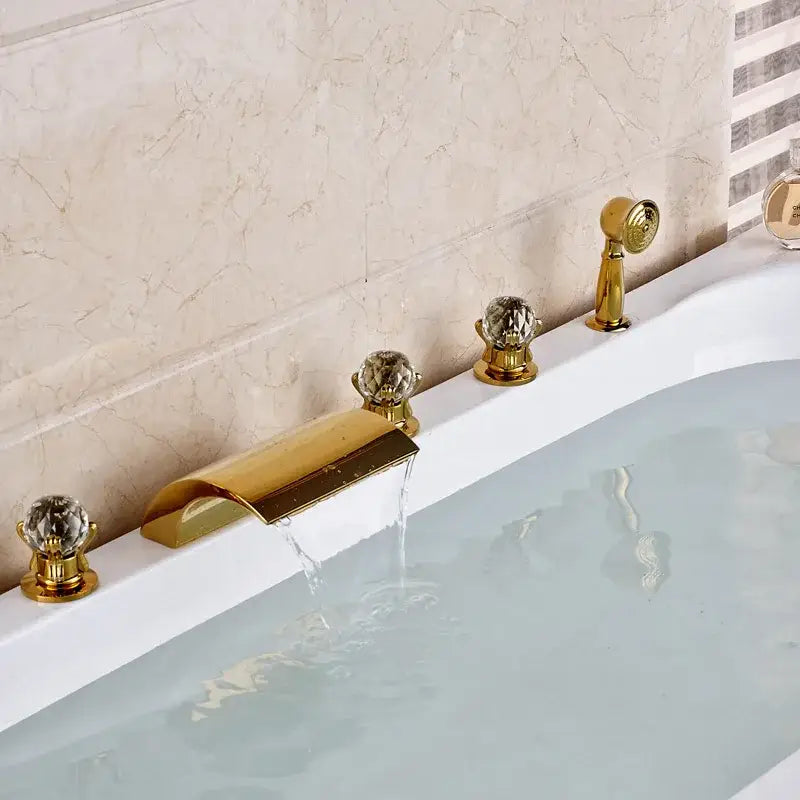 Ornate gold led waterfall bath tub faucet with crystal knobs and curved spout in sleek metallic finish for tub faucet use