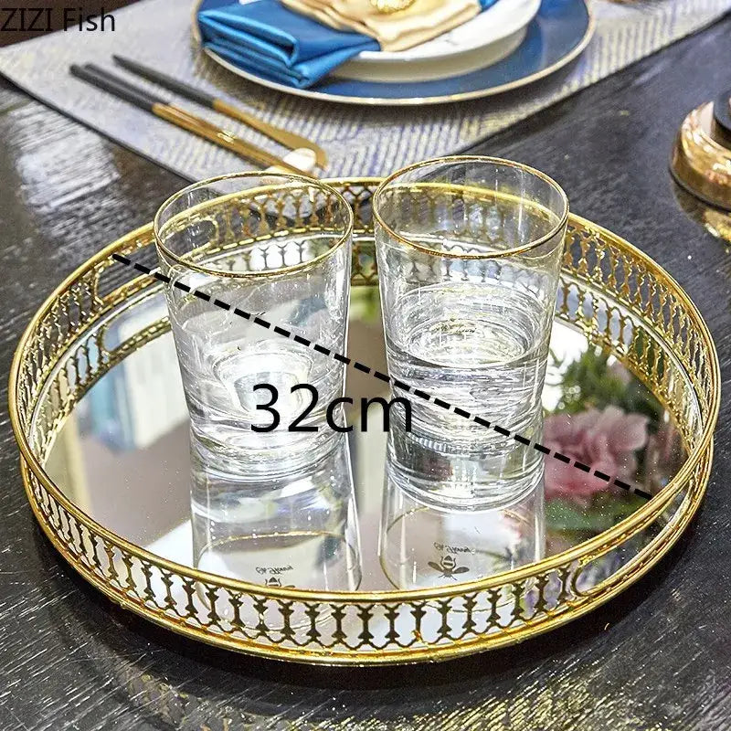Ornate gold mirror glass storage tray with gold-framed mirrored surface and lattice detailing 32cm diameter