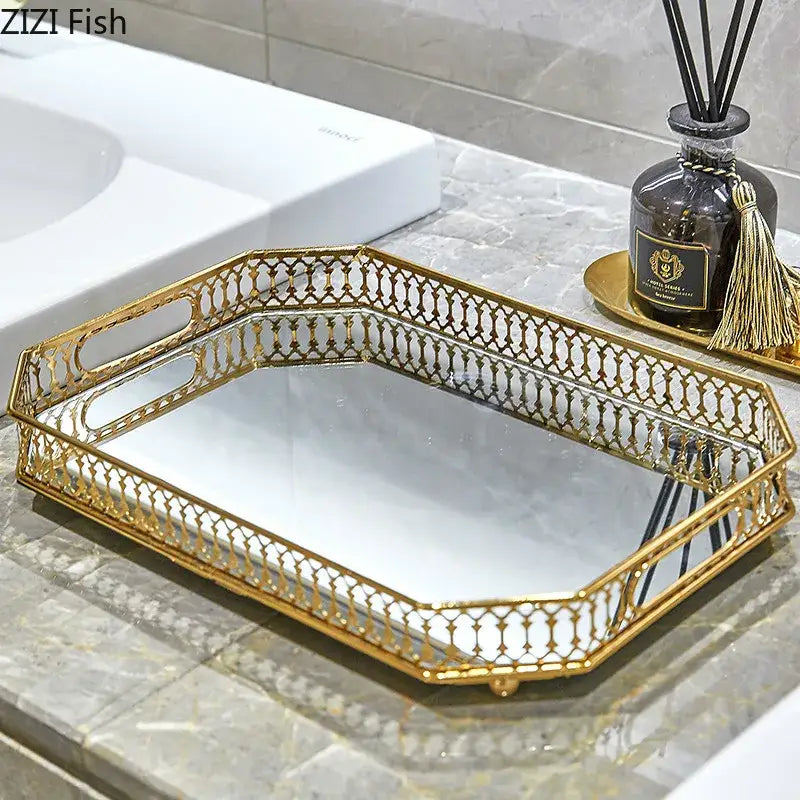 Ornate gold mirror glass storage tray with intricate lattice edges and mirrored interior for bedroom jewelry decor