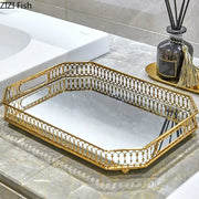 Ornate gold mirror glass storage tray with decorative lattice edges and mirrored interior for bedroom jewelry decor