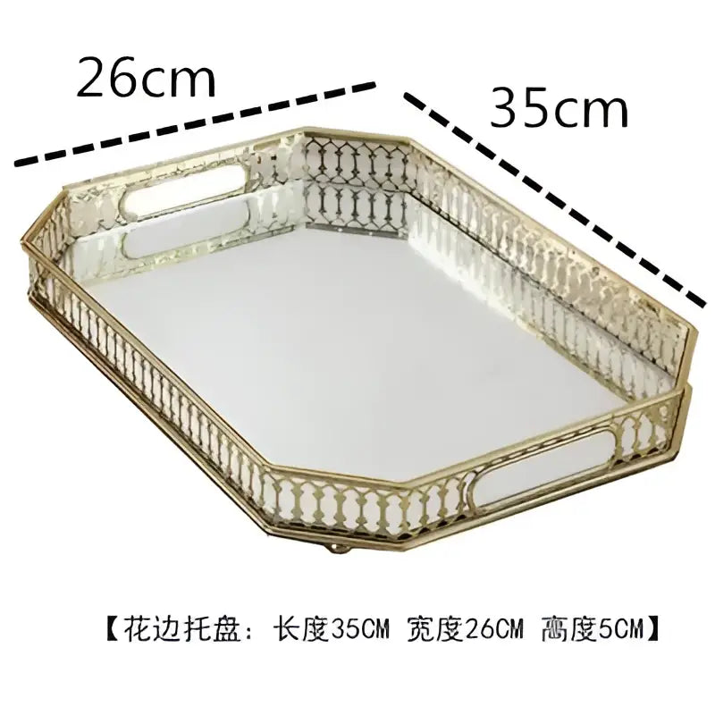Ornate gold mirror glass storage tray with a gold-toned metal base and beaded border for bedroom jewelry decor