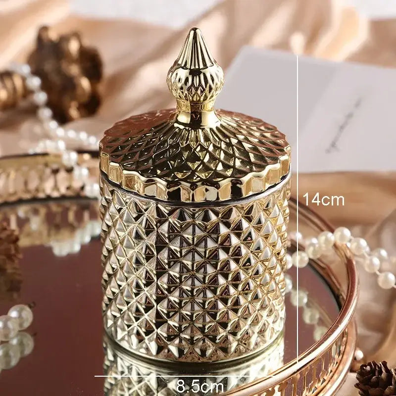 Ornate gold faceted glass storage jar with diamond pattern and pointed lid for elegant bedroom decor