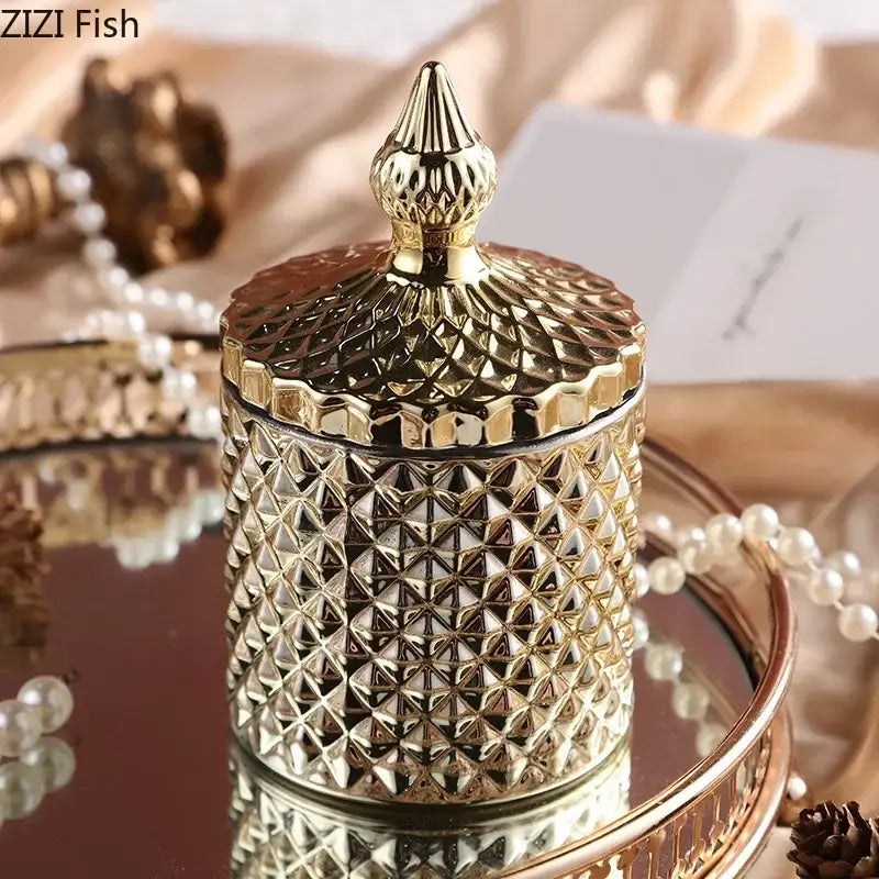 Gold-toned faceted glass storage jar with diamond pattern and ornate pointed lid for elegant bedroom decor