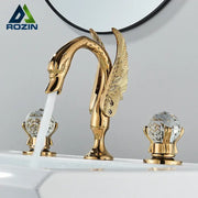 Ornate gold swan basin faucet by rozin with crystal handles and feathered wings for elegant bathroom decorbites gold swan