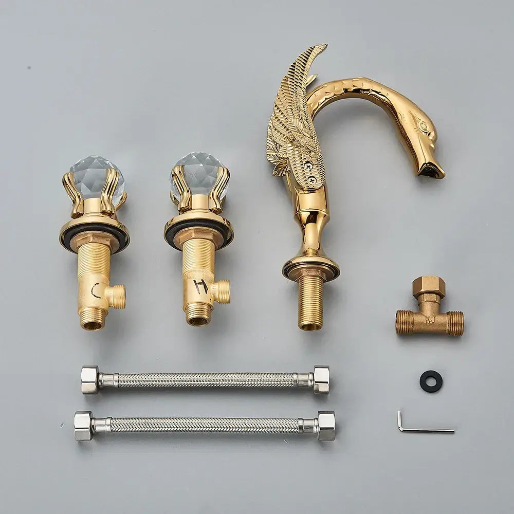 Ornate gold swan basin faucet with intricate feather detailing and crystal knob handles for bathroom decorbites gold swan