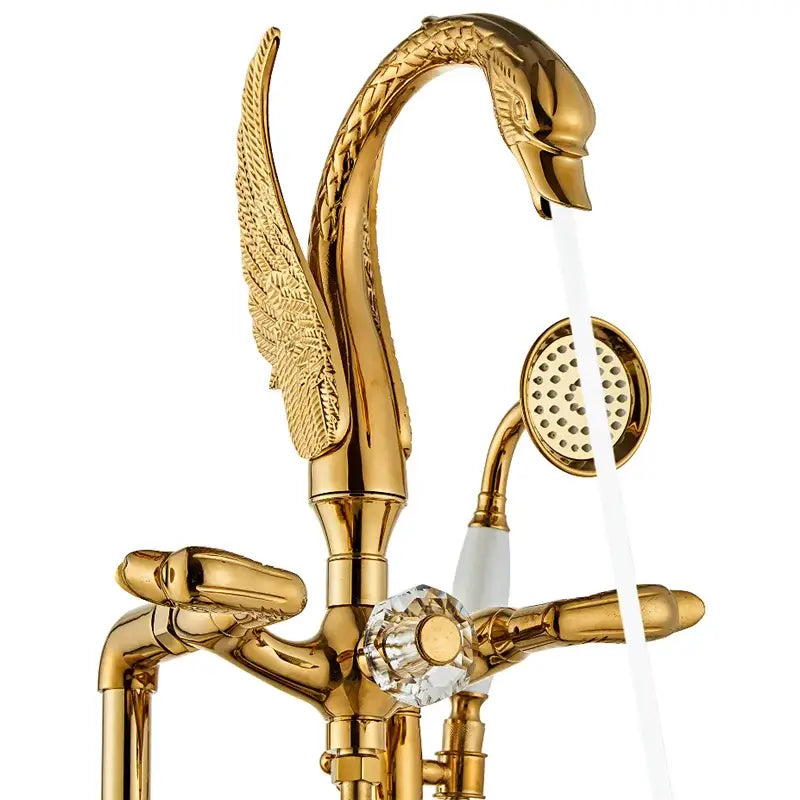 Ornate decorbites gold swan bathtub mixer with intricate feather detailing and crystal knob for luxury bathroom decor