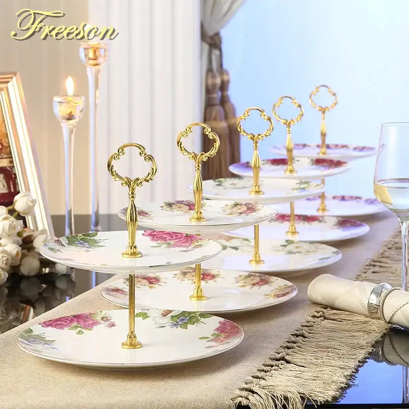Ornate gold finished three tiered dessert stand with floral porcelain plates set ideal as a fruit plates set