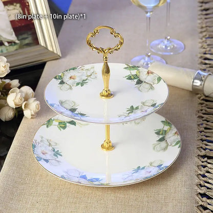 Elegant two-tier porcelain fruit plates set with gold-finished ornate handle and floral design for dining room use