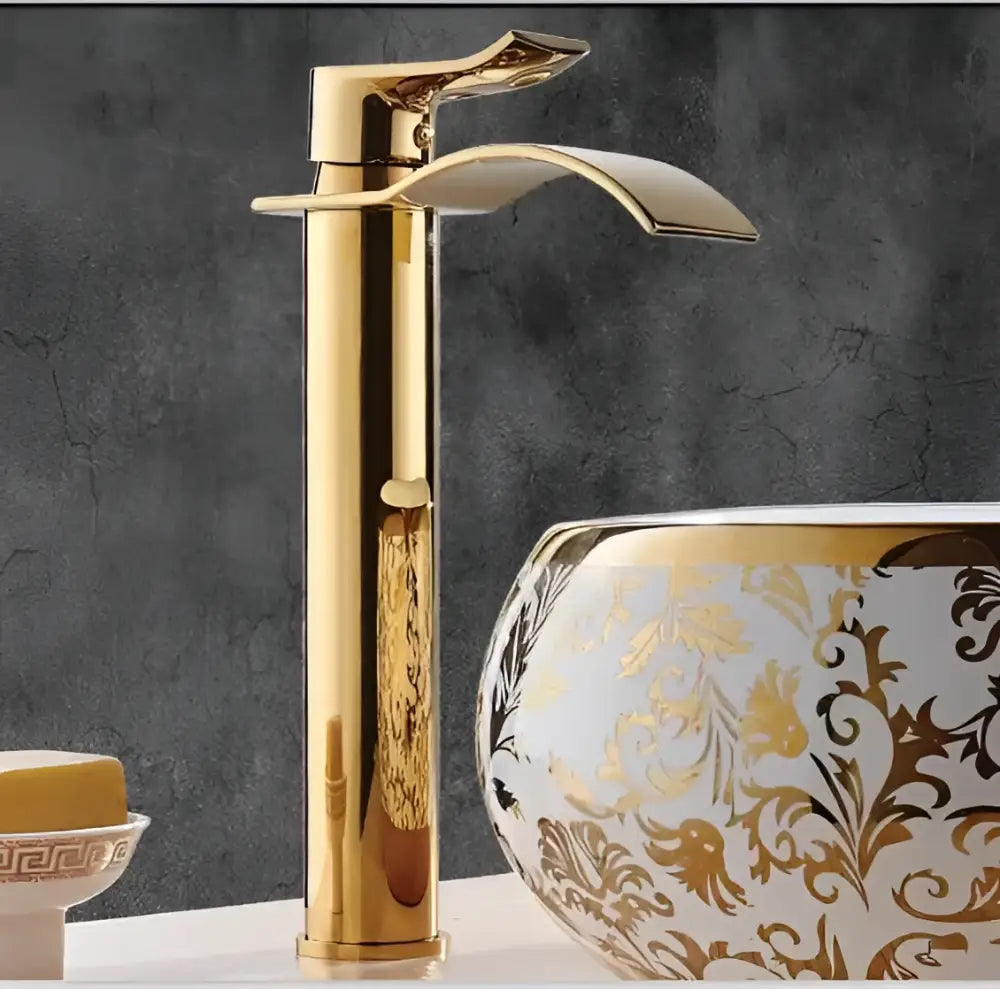 Ornate decorbites gold waterfall bathroom faucet with sleek gold finish and floral etching for basin mixer tap