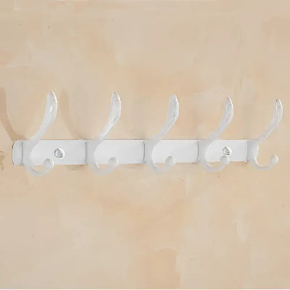 White metal coat rack with five curved hooks from ornate gold and white ceramic decorbites bathroom accessories set