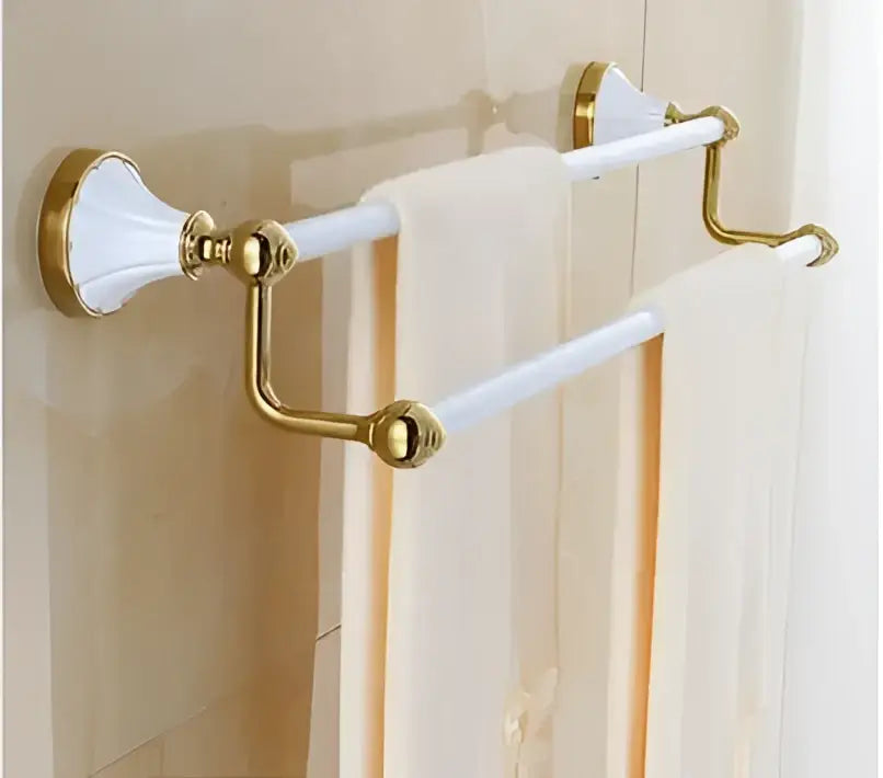 Ornate gold and white ceramic double towel rack with polished brass accents from decorbites bathroom accessories set