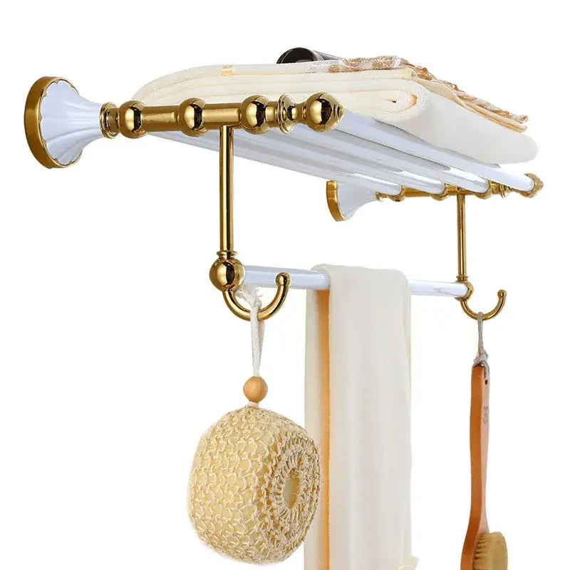 Ornate gold and white ceramic bathroom towel rack with intricate detailing from decorbites bathroom accessories set
