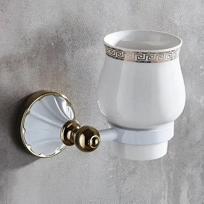 White ceramic toothbrush holder with gold greek key trim and wall bracket from decorbites bathroom accessories set