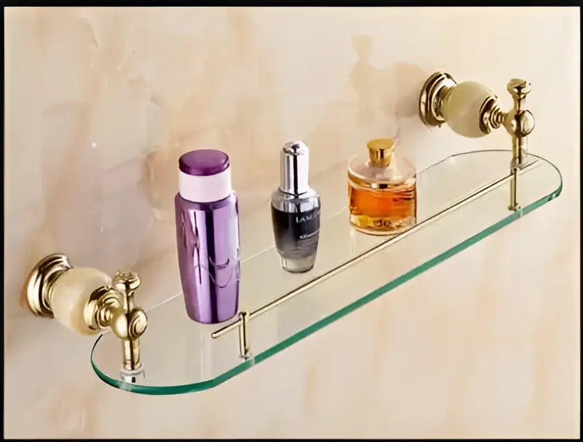Ornate gold and white ceramic brass jade bathroom hardware set with clear glass shelf and marble backing by decorbites brass jade
