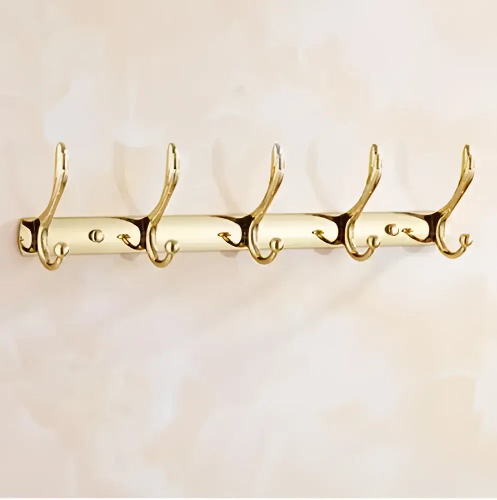 Gold-colored metal coat rack with five hooks from decorbites brass jade bathroom hardware set for elegant organization