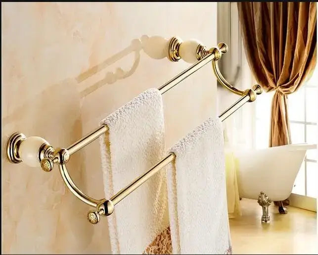 Ornate gold and white ceramic brass jade bathroom hardware set featuring a double-tier towel rack with marble-like finials