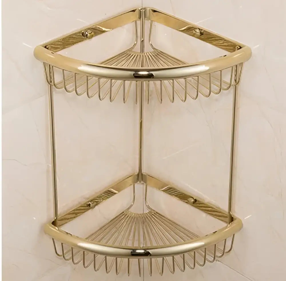 Gold-toned double-tier corner shower caddy with wire mesh design from ornate gold and white ceramic brass jade hardware set by decorbites