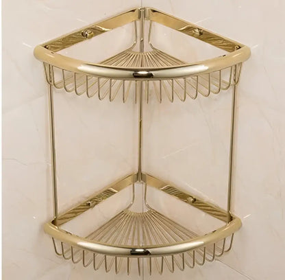 Gold-toned double-tier corner shower caddy with wire mesh design from ornate gold and white ceramic brass jade hardware set by decorbites