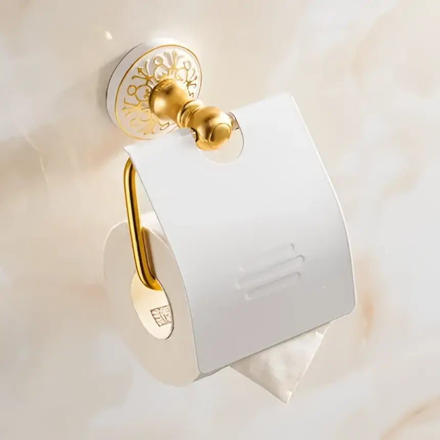 Ornate gold-toned toilet paper holder with floral detailing in decorbites bathroom accessories set for stylish bathroom decor