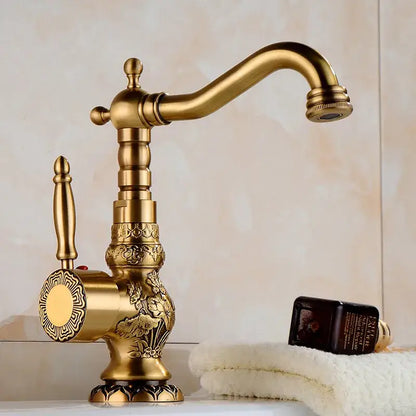Ornate golden brass carved bathroom faucet with brass carved bathroom floral engraving and decorative fluted spout by decorbites
