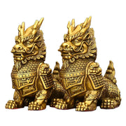 Ornate golden brass copper unicorn ornaments featuring chinese guardian lion statues with intricate dragon-scale armor
