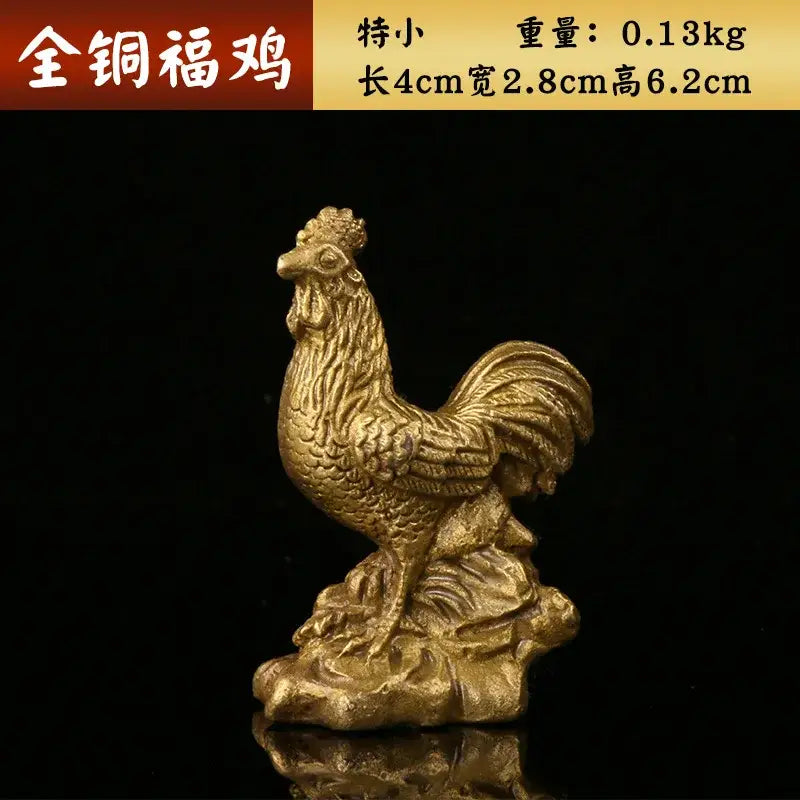 Ornate golden brass rooster figurine with intricate feather detailing for office desktop decor by decorbites brass rooster