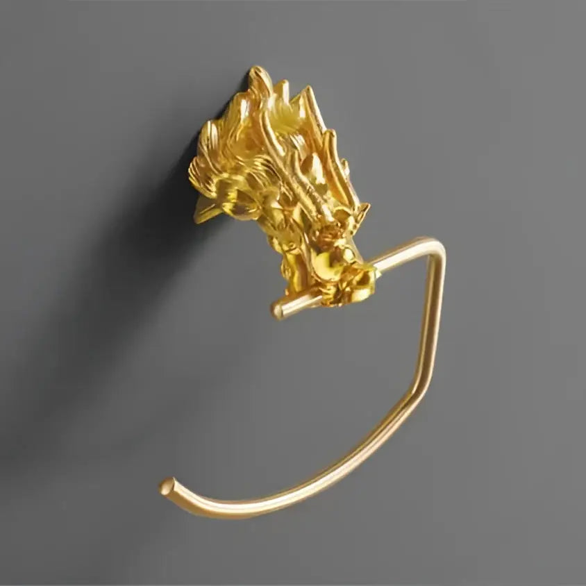 Ornate golden dragon bathroom hardware set featuring an intricate towel rack with polished metallic finish and white ceramic