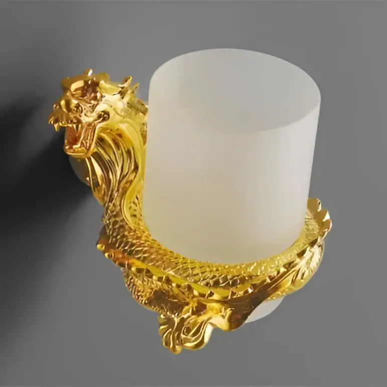 Ornate golden dragon bathroom hardware set featuring a wall-mounted toothbrush holder with frosted white ceramic cup